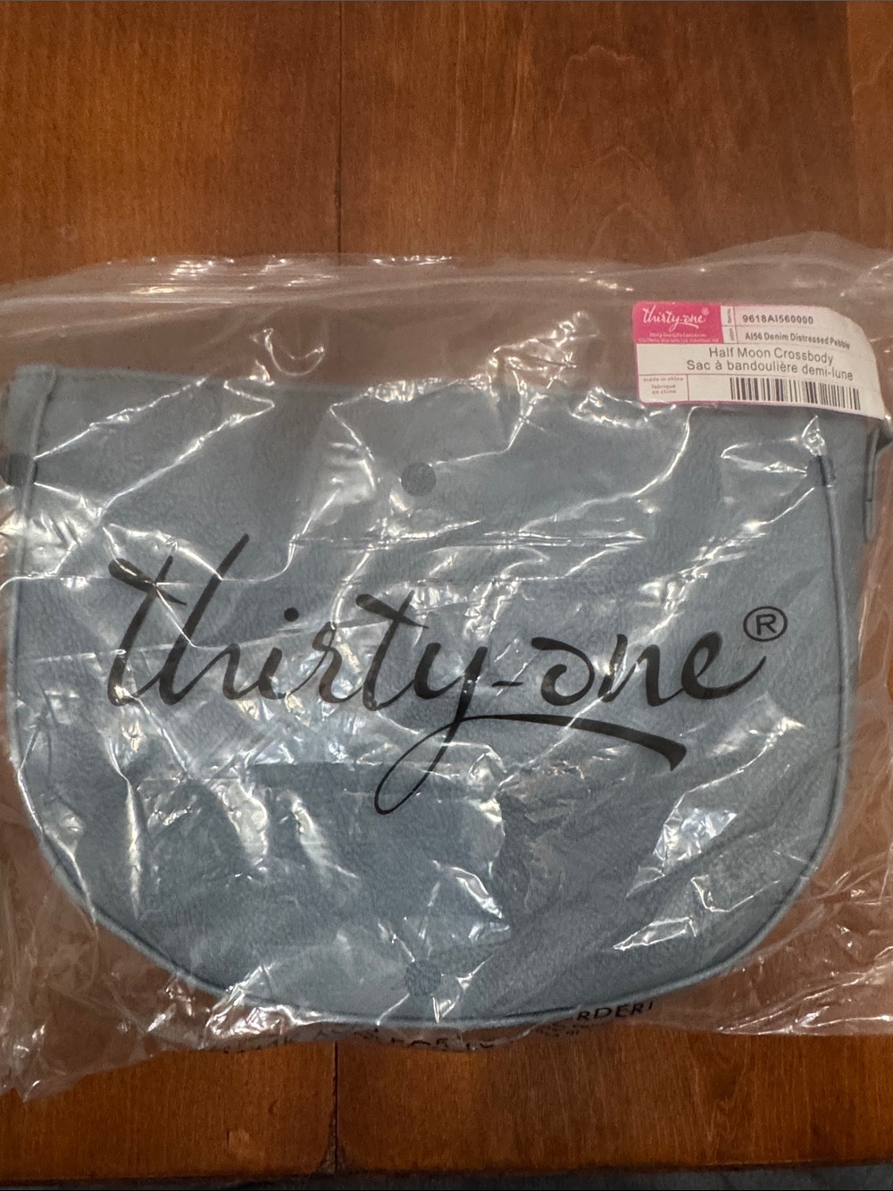 thirty-one Light Denim Half Moon Crossbody